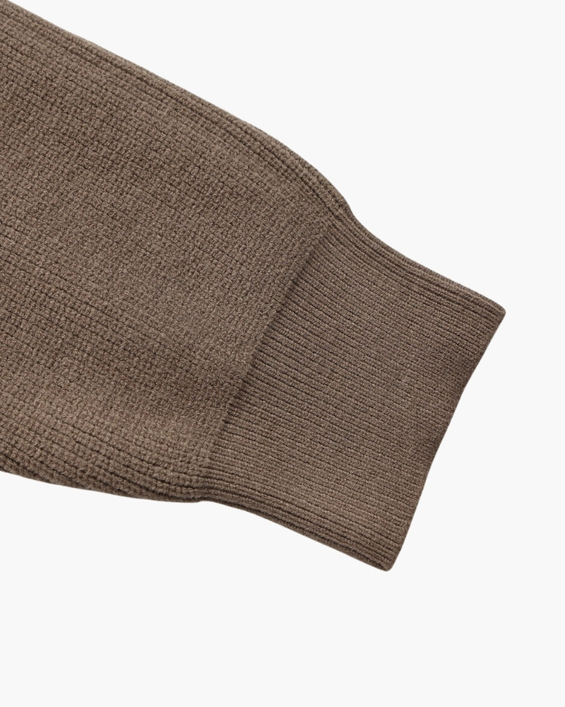 Pull en maille raffiné à demi-zip